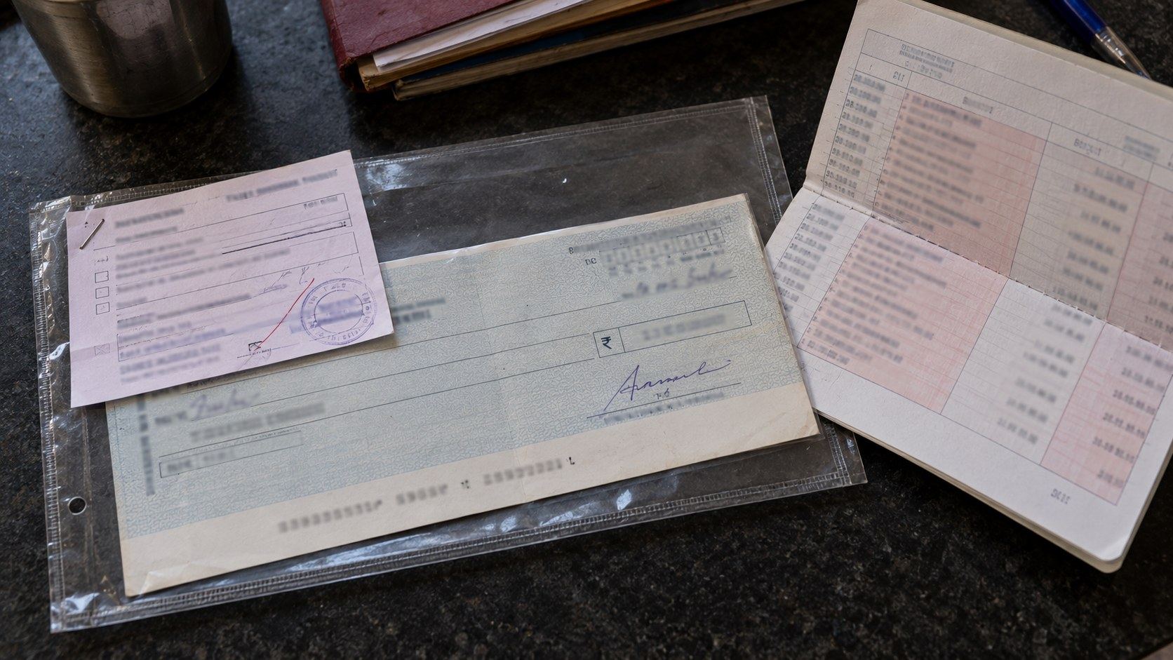 The original cheque and the bank return memo